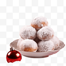 红餐巾上有糖粉的球甜甜圈和圣诞