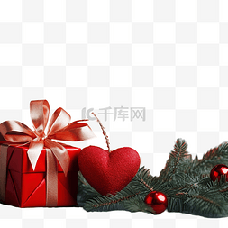 圣诞树树枝上绑着两颗红心，上面