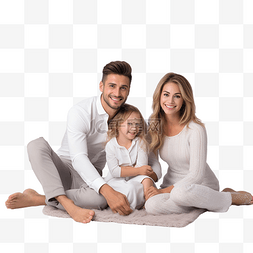 一个幸福的家庭坐在白色壁炉旁的