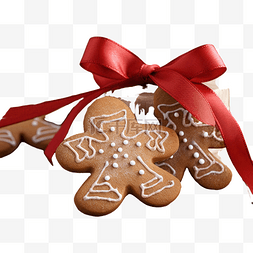 台木图片_木桌上绑着圣诞弓的姜饼饼干