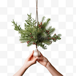 装饰小桌子图片_女手握着树枝装饰旁边的小圣诞树