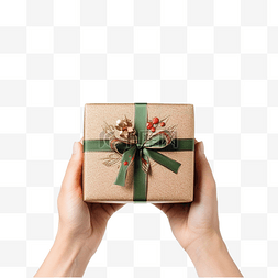 明亮之星图片_手拿着圣诞礼品盒和带圣诞装饰的