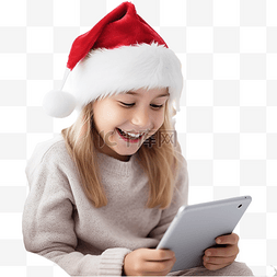 拿着平板的人图片_快乐的白人女孩坐在室内的圣诞装