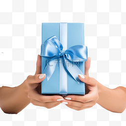 蓝丝带礼盒图片_女手拿着包装圣诞礼盒，用蓝丝带