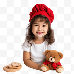 小女孩抱着图片_圣诞快乐，戴着圣诞帽的可爱小女