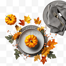 叶盘子图片_感恩节餐桌布置，配有南瓜和彩色