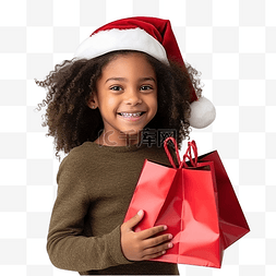 小孩在微笑图片_一个戴着圣诞帽和手提袋的快乐黑