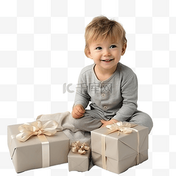 男婴派对图片_家里有圣诞礼物的男婴躺在床上，