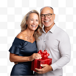 老年女性图片_成熟快乐的夫妇拿着礼物盒在圣诞