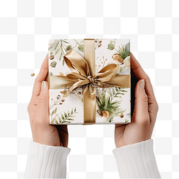 特写包装礼物在手圣诞自然装饰盒