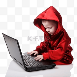 计算机孩子图片_万圣节穿着魔鬼服装的小男孩使用