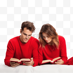 看書图片_穿着红色圣诞毛衣的夫妇在家里的