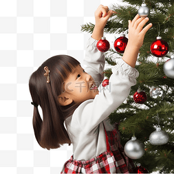 一代宗师图片_特写亚洲小女孩用装饰品装饰圣诞