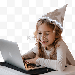 科技笔记本电脑图片_圣诞节期间，女孩在儿童房使用笔