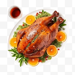 圣诞餐桌图片_圣诞餐桌上配有橙子和酱汁的烤鸭
