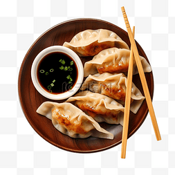 一盘午餐肉图片_黑盘酱油和筷子上的饺子食品