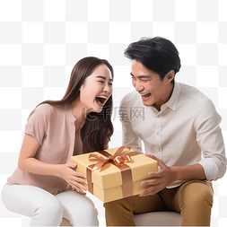亚洲年轻夫妇打开礼物礼盒庆祝生