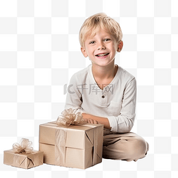 快乐的白人金发男孩拿着礼物坐在