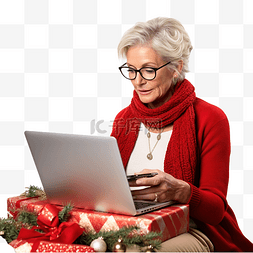 膝上型图片_圣诞节期间在笔记本电脑上工作的