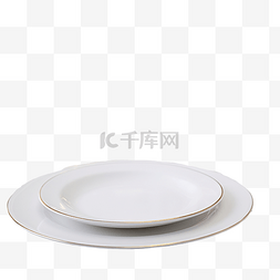 白盘子勺子图片_圣诞桌上有餐具的白盘子