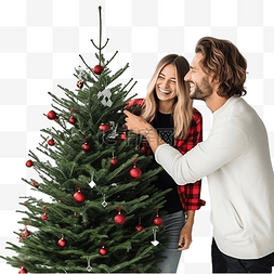 美丽的年轻夫妇在家装饰圣诞树