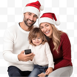 人拿手机拍照图片_圣诞节气氛中微笑的年轻家庭用智