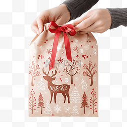 手里拿着可爱的驯鹿装饰的圣诞礼