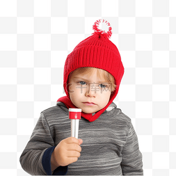儿童安全帽子图片_戴着红色圣诞老人帽子的小男孩拿