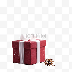 桌子上放着一个红色圣诞礼盒，上