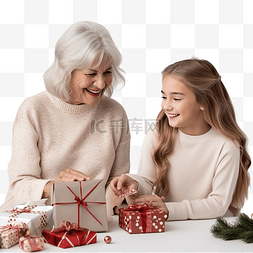 微笑的祖母带着孙女在圣诞节装饰