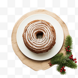 圣诞装饰旁边的 bolo de rolo蛋糕卷