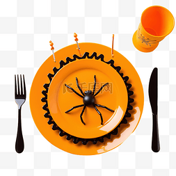 万圣节晚餐，空橙色盘装饰黑蜘蛛