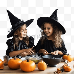 两个身着女巫服装的不同儿童女孩