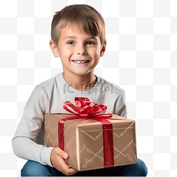 小鹿圣诞主题图片_圣诞树附近一个男孩打开圣诞礼物
