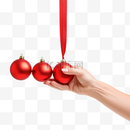 女手握着圣诞装饰旁边的红色手机