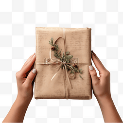 女天然图片_女手用天然复古纸包裹圣诞礼物