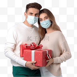 居家隔图片_戴着医用口罩手里拿着圣诞礼物的