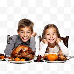 吃美食的孩子图片_孩子们吃火鸡感恩节庆祝概念