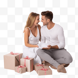 送禮图片_快乐的年轻夫妇坐在燃烧的壁炉旁