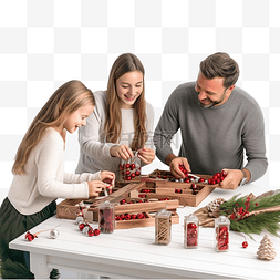 家庭在木桌上准备圣诞礼物的装饰