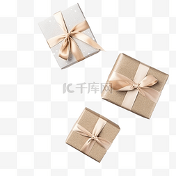 漂亮弓图片_灰色表面上漂亮的礼品盒和圣诞装