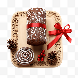 切块椰蓉蛋糕图片_圣诞装饰旁边的 bolo de rolo蛋糕卷