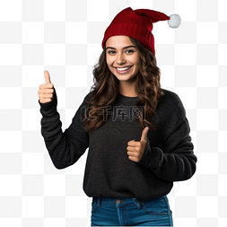 成功人士手势图片_戴着圣诞帽头戴孤立蓝色的女孩做