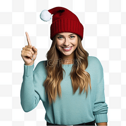 蓝帽子标志图片_戴着圣诞帽的女孩在孤立的蓝墙上