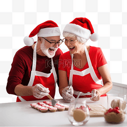 穿着围裙戴着圣诞红帽的老夫妇在