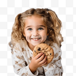 微笑的饼干人图片_小女孩在圣诞树的背景下吃饼干