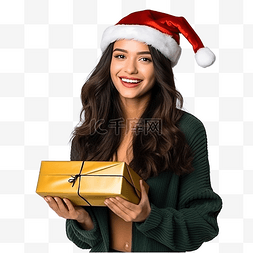 圣诞老人派礼物图片_戴着圣诞帽的小女孩在孤立的墙上