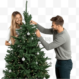 年轻恩爱的夫妻一起装饰圣诞树