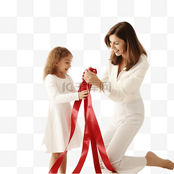 小女孩帮妈妈剪包装圣诞礼物的红