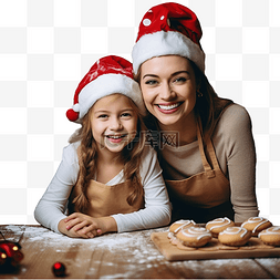 坐在餐桌旁的孩子图片_戴着圣诞帽的快乐妈妈和女儿坐在